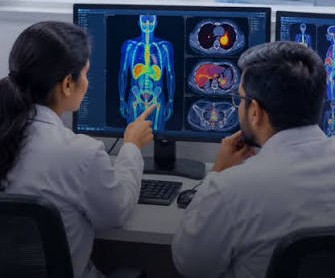 Radiologist reviewing PET CT scan images